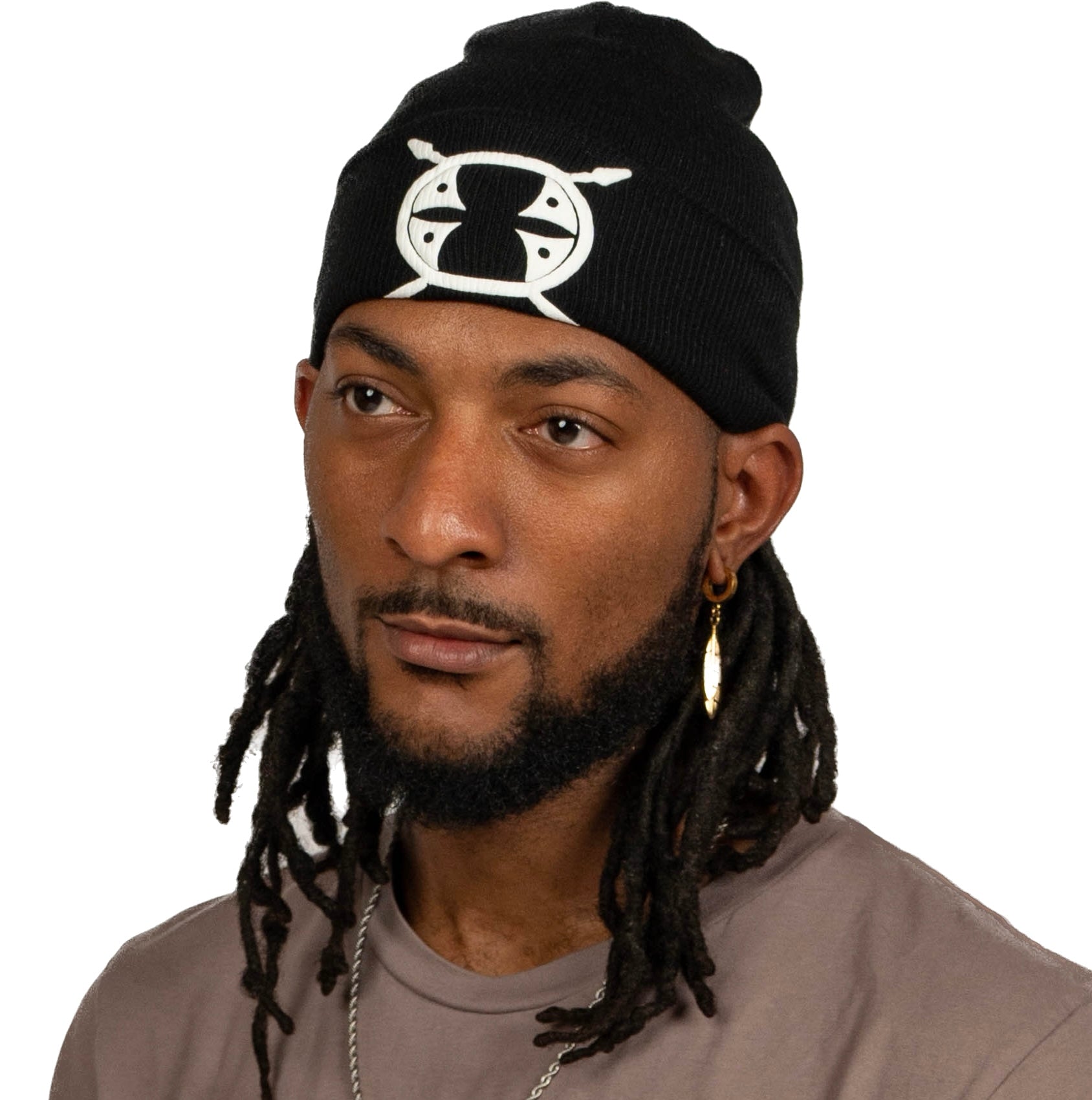 male model looking left wearing a black Schleepwear logo beanie.